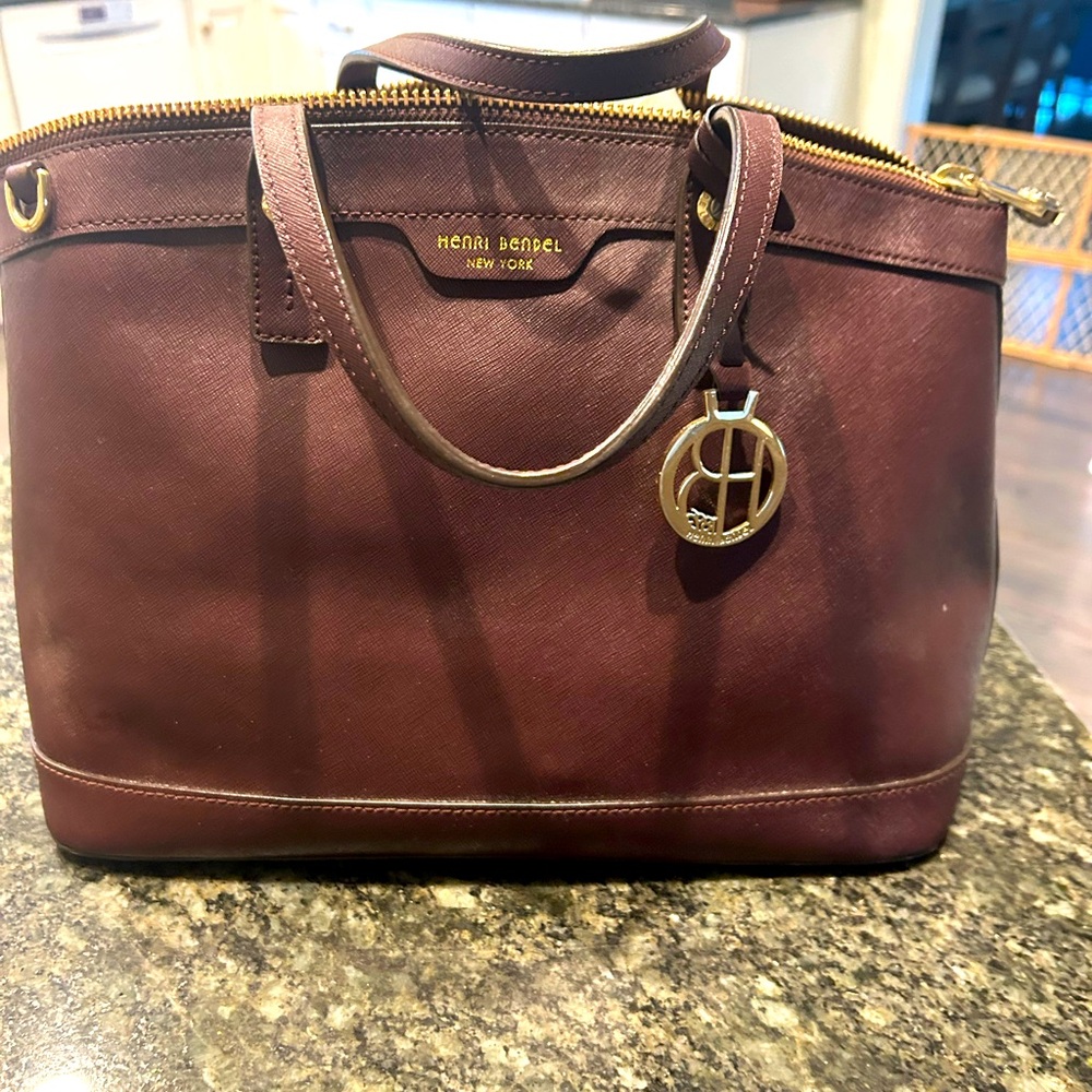Only used a few times, color is Burgundy, no rips, no tears, inside is pristine